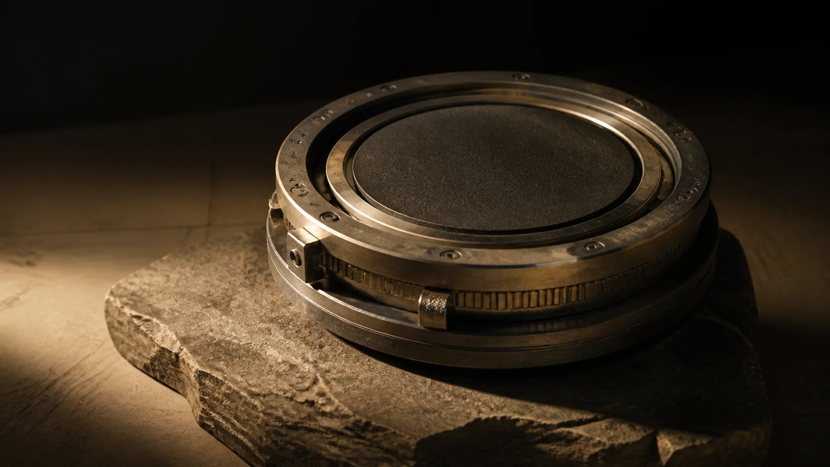 Editorial still life of a solid mechanical core inside an adjustable calibration ring