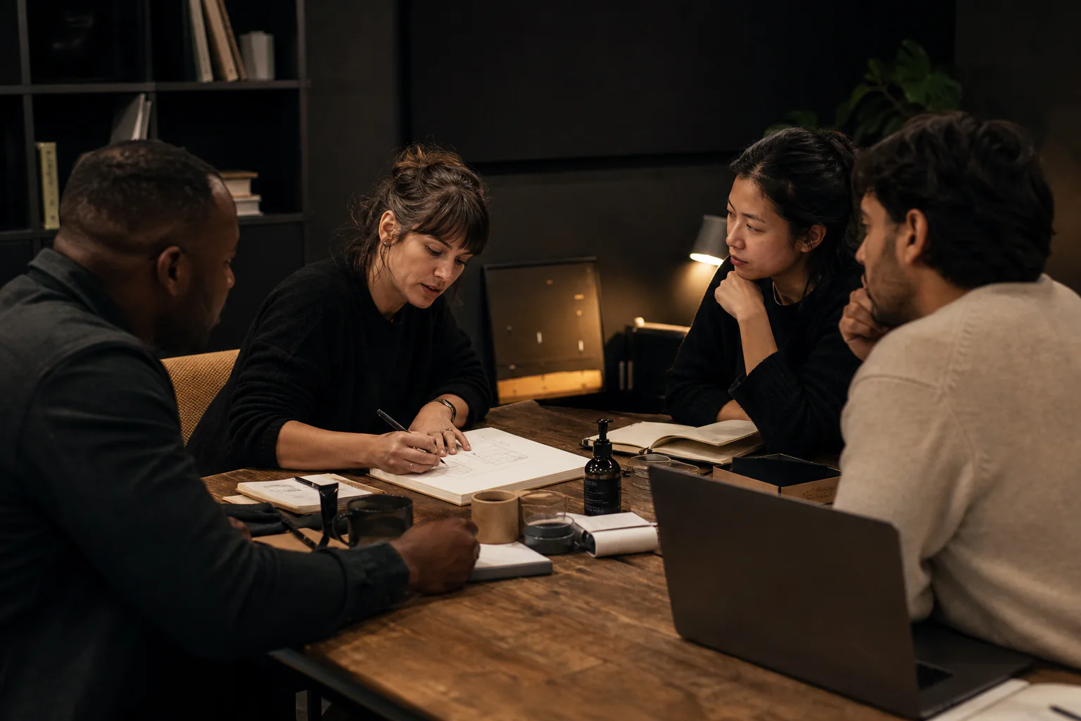 Editorial scene of a specialist helping founders work through an operating challenge